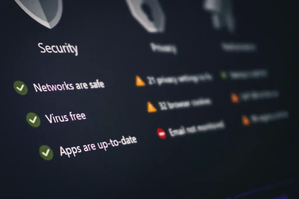 Cyber security for small businesses with an IT professional monitoring network security and threat detection dashboard.