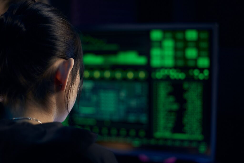 Profession providing managed cybersecurity services by monitoring security dashboards to identify potential threats.